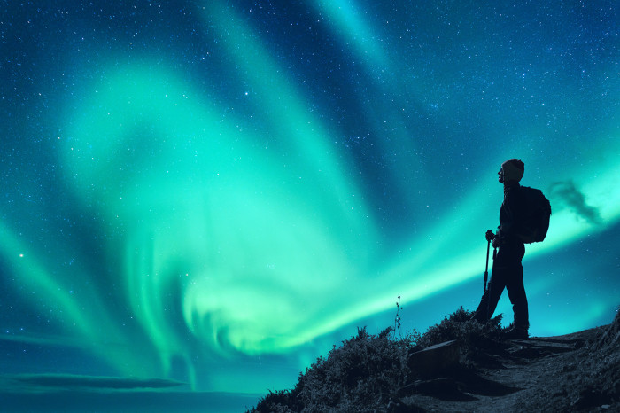 aurora-borealis-and-silhouette-of-a-woman